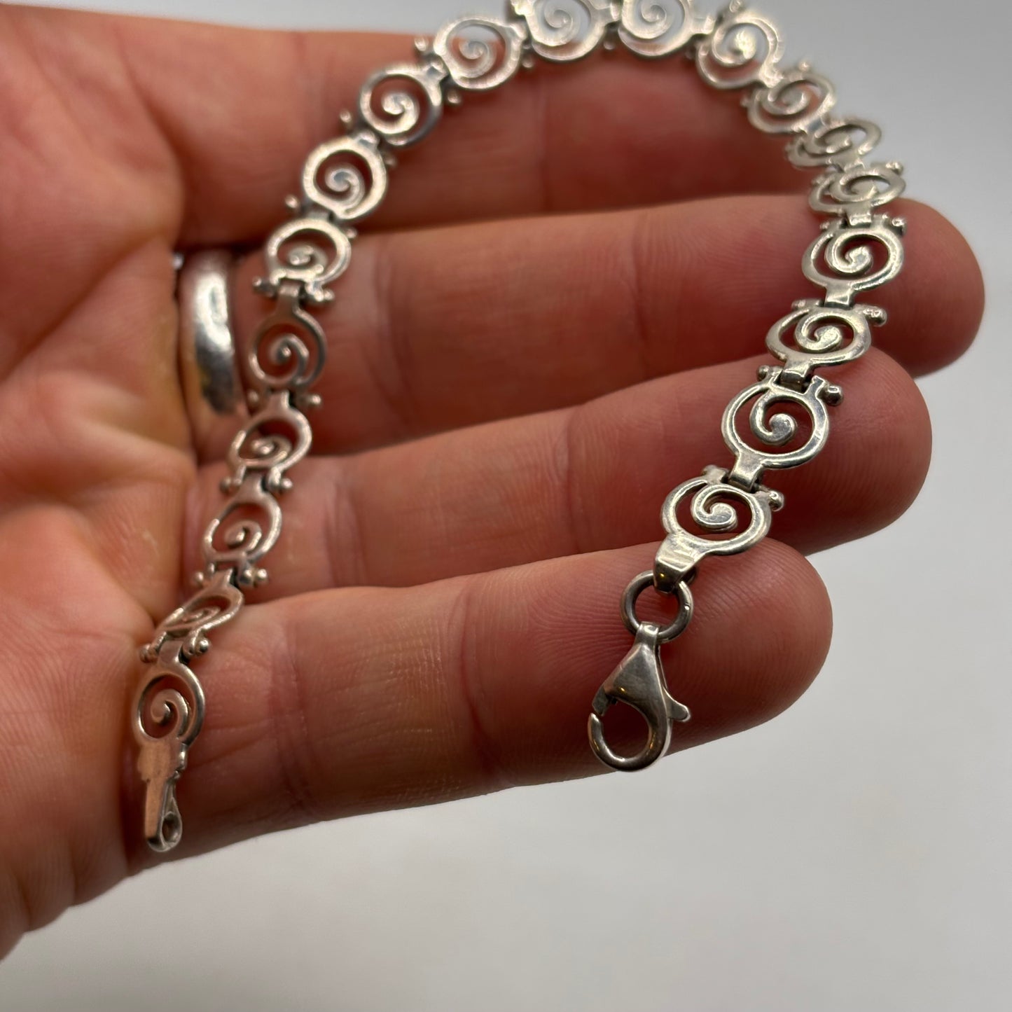 Silver 7.5” Swirl Bracelet