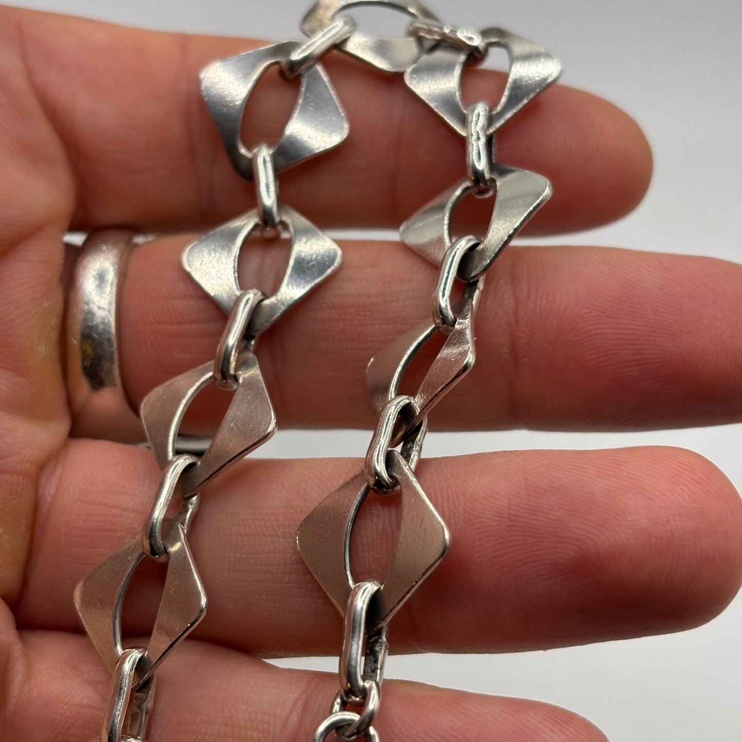 Silver 8” Abstract Bracelet