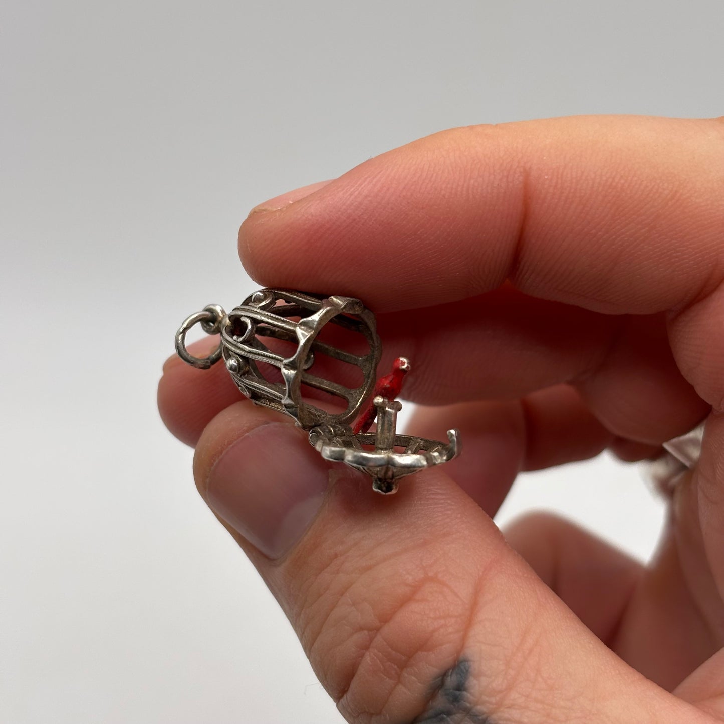 Silver Red Enamel Parrot Cage Pendant