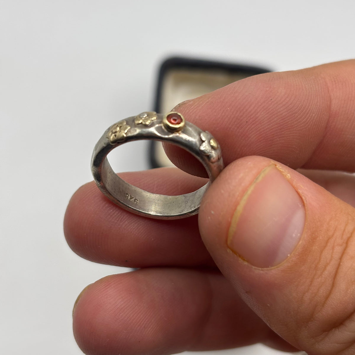 Silver Talma Keshet Garnet Flower Ring (N 1/2)