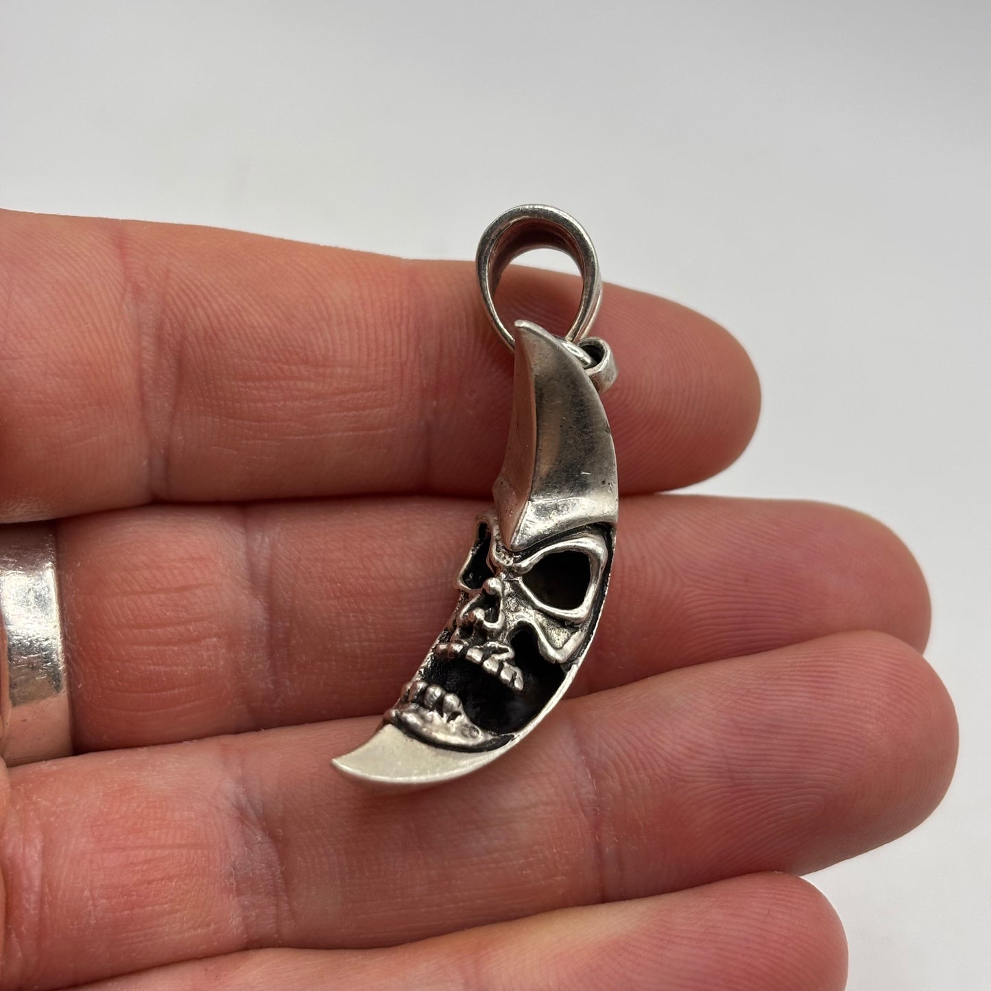 Silver Skull In Moon Pendant
